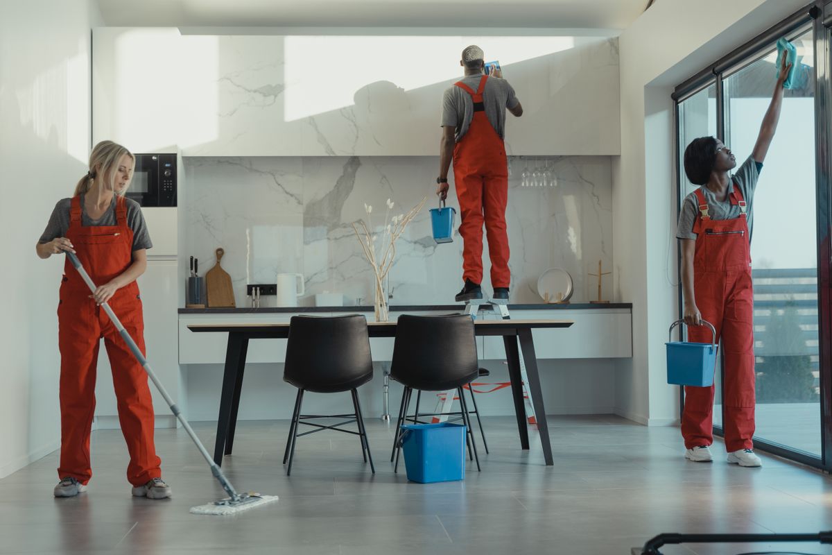 Professional cleaning crew caring for a shared workspace